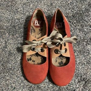 Shoes by Fly London.